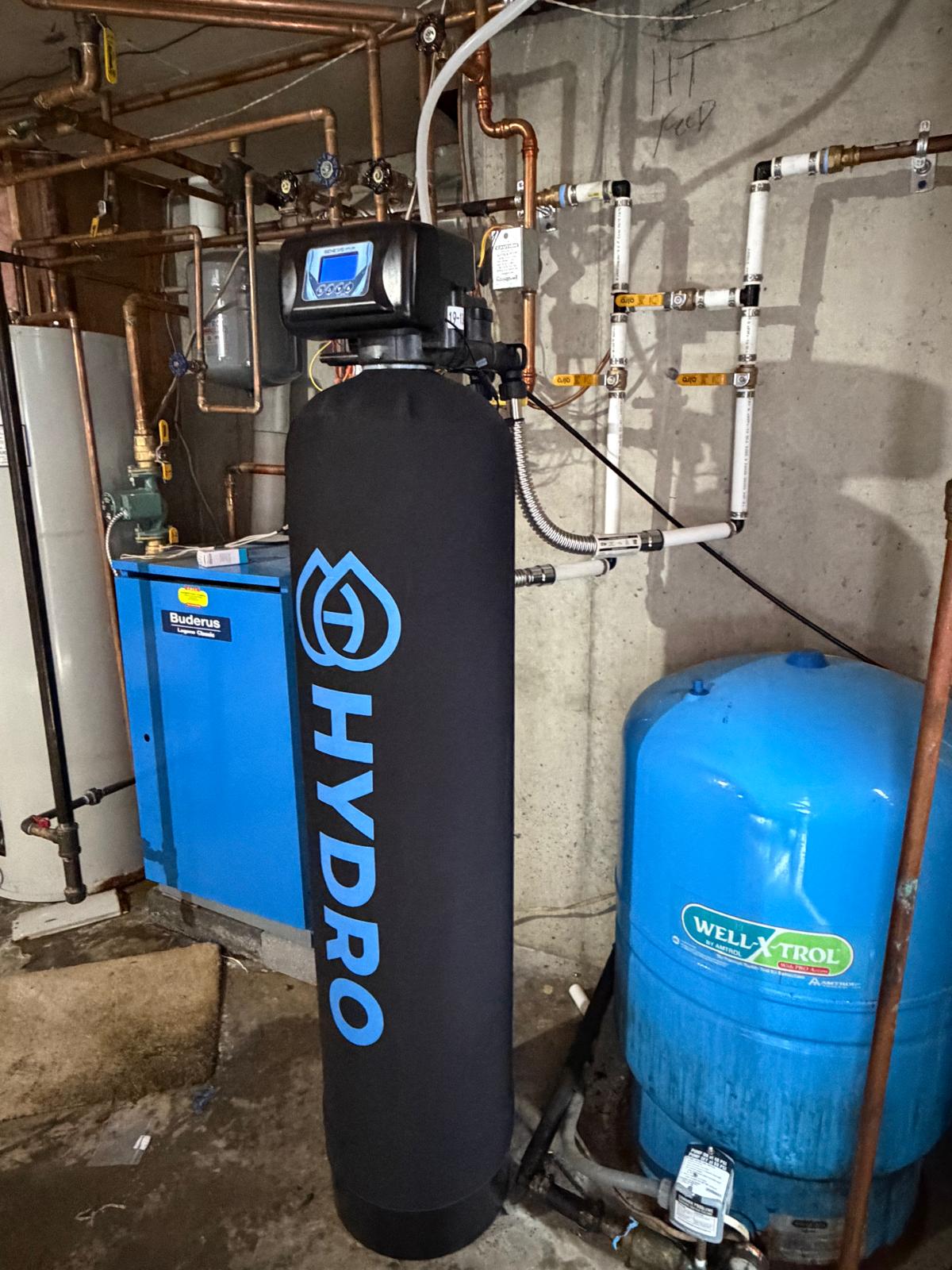 Filtration tank beside pressure tank