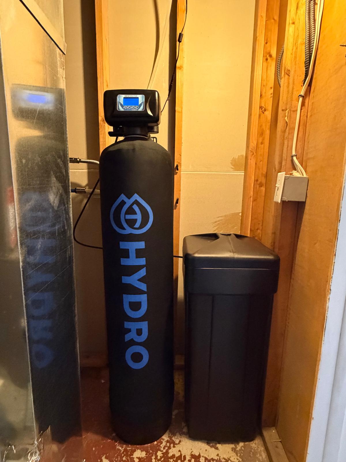 Compact softener install in utility closet